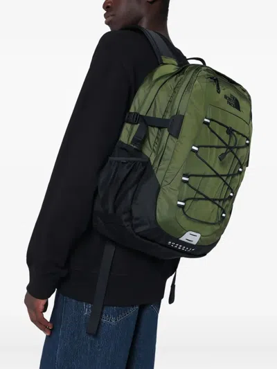 The North Face Backpack With Front Zip Pocket And Bungee Cord System In Green
