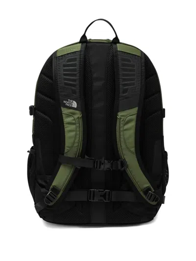 The North Face Backpack With Front Zip Pocket And Bungee Cord System In Green