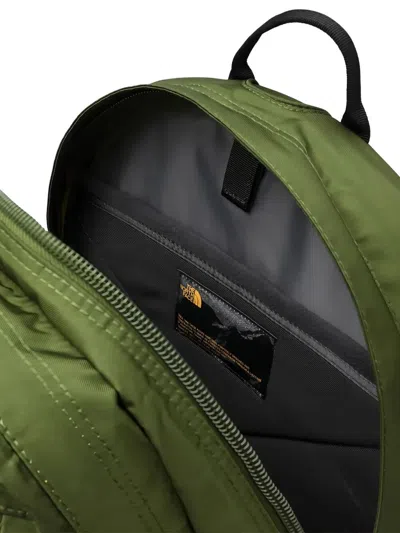 The North Face Backpack With Front Zip Pocket And Bungee Cord System In Green