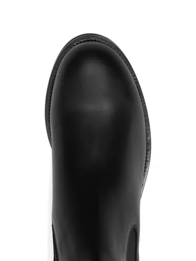 The Row Lug-sole Chelsea Boots In Black