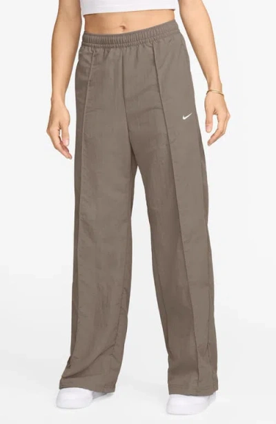 Nike Sportswear Everything Wovens Mid-rise Open-hem Pants In Brown