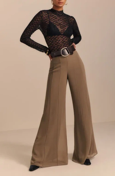 Reformation Nell Turtleneck Jersey Top In Black