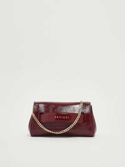 Orciani Gossip Xs Vinyl Clutch In Burgundy