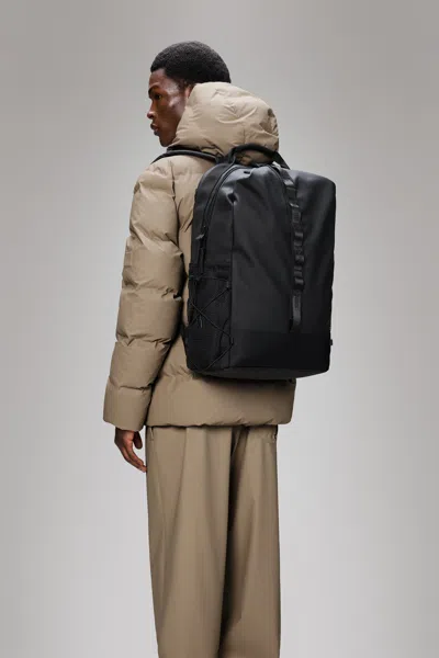 Rains Trail Clip Front Backpack In Black