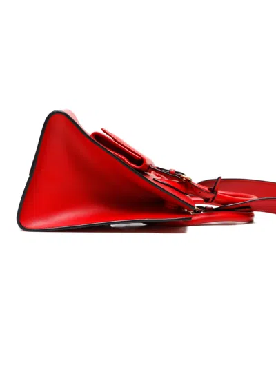 Pre-owned Prada 2020-2025 Embossed Monochrome Bag In Red