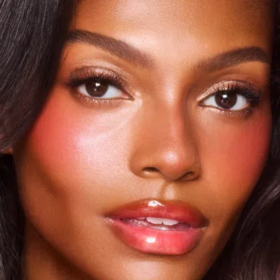 Charlotte Tilbury Unreal Lip + Cheek Glow Blush Stick With Hyaluronic Acid