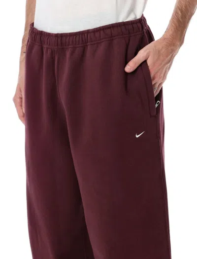 Nike Logo-embroidered Track Pants In Brown