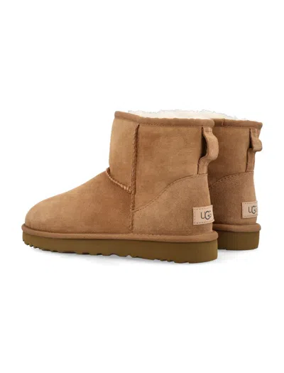 Ugg Classic Mini Ii Suede Boots With Shearling Lining In Brown