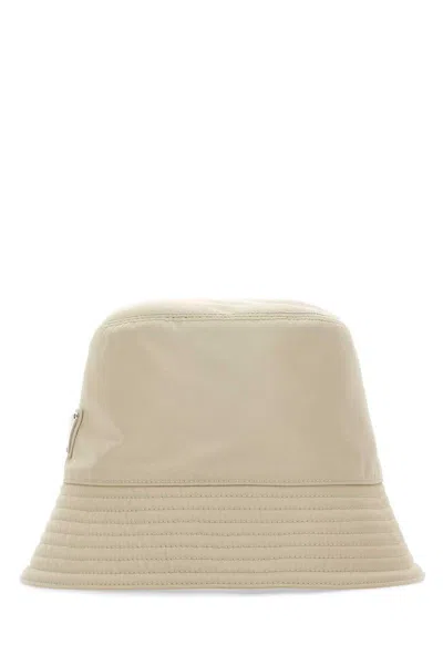 Prada Recycled Nylon Hat Featuring Metal Accents In Brown