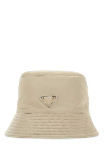 Prada Recycled Nylon Hat Featuring Metal Accents In Brown