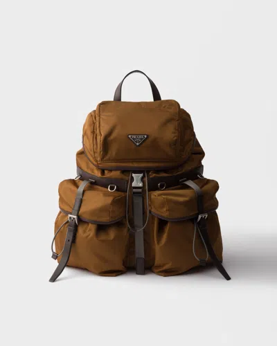 Prada Re-nylon And Leather Backpack In Brown