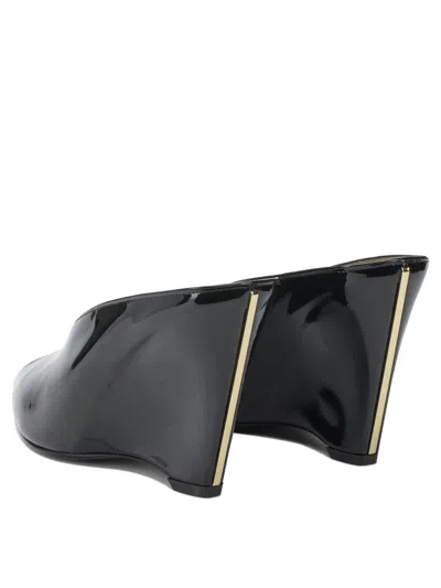 Ferragamo Leather Mules With Wedge Heel And Glossy Finish In Black
