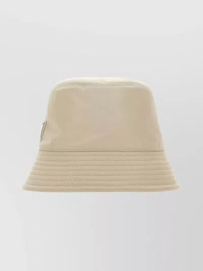 Prada Recycled Nylon Hat Featuring Metal Accents In Neutral