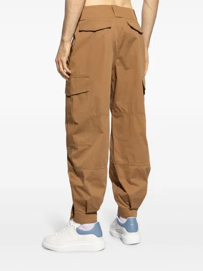 Alexander Mcqueen Low-waisted Cargo Pants With Ankle Buttons In Brown