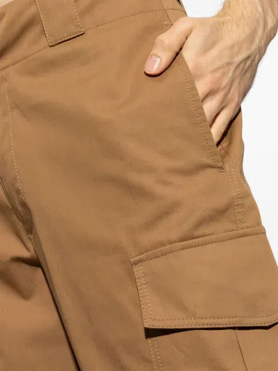 Alexander Mcqueen Low-waisted Cargo Pants With Ankle Buttons In Brown