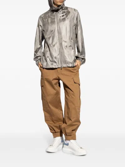Alexander Mcqueen Low-waisted Cargo Pants With Ankle Buttons In Brown
