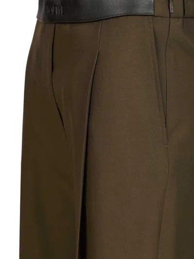 Loewe Logo Embossed Pleat Detail Trousers In Brown