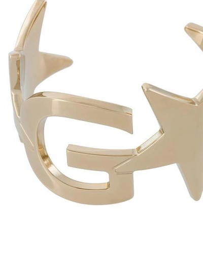 Shop Givenchy Logo And Star Cuff In Metallic