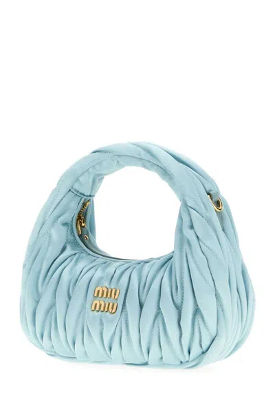 Miu Miu Handbags. In Blue