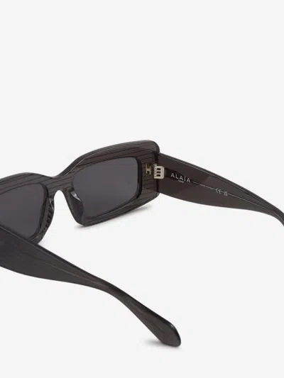 Alaïa Rectangular Sunglasses In Black