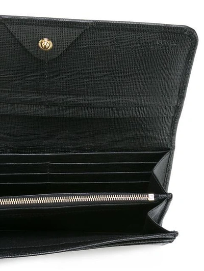 Shop Fendi Classic Flap Wallet In Black
