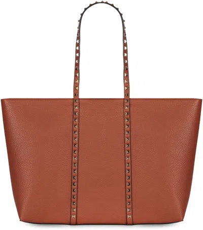 Valentino Garavani Shopping Rockstud Bag In Leather In Brown