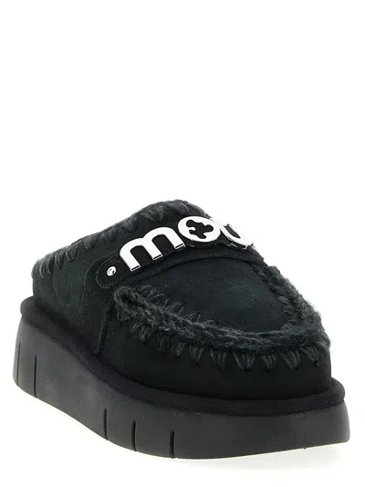 Mou Bounce Black Mules With Logo Lettering And Open Rear In Suede Woman In Black