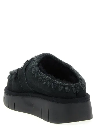 Mou Bounce Black Mules With Logo Lettering And Open Rear In Suede Woman In Black