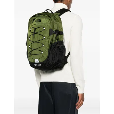 The North Face Backpack With Front Zip Pocket And Bungee Cord System In Green