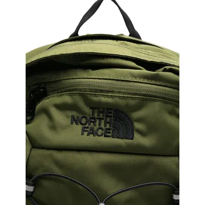 The North Face Backpack With Front Zip Pocket And Bungee Cord System In Green