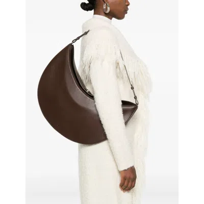 Jacquemus Le Calisso Rond Large Brown Shoulder Bag With Adjustable Strap And Embossed Logo In Leathe