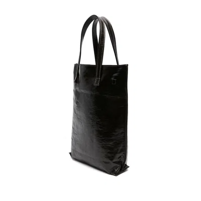 Uma Wang Carry A Handbag With Both Hands In Black