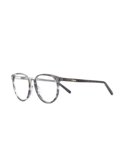 Shop Chloé Oval Frame Glasses In Grey