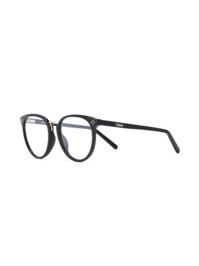 Shop Chloé Oval Frame Glasses In Black