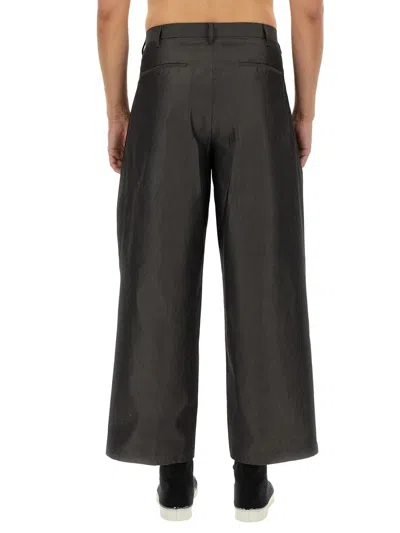 Aïe Pleated Cotton Trousers In Gray