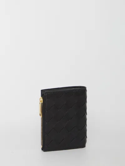 Bottega Veneta Textured Black Wallet With Signature Woven Pattern In Black