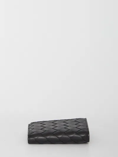 Bottega Veneta Textured Black Wallet With Signature Woven Pattern In Black