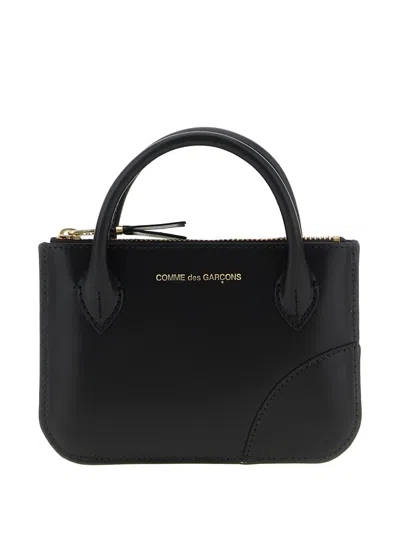 Comme Des Garçons Logo-print Wallet In Neutral