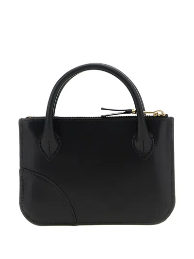 Comme Des Garçons Logo-print Wallet In Neutral