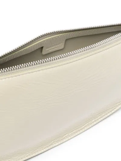Burberry Shield Sling Bags In Neutral