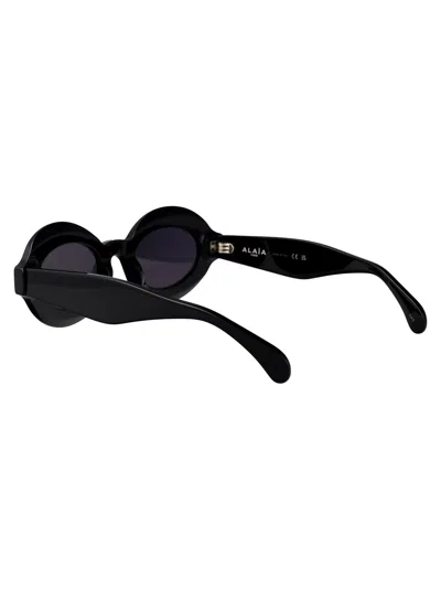 Alaïa Oval-frame Acetate Sunglasses In Black