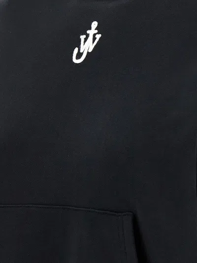 Jw Anderson Cropped Black Hoodie With Subtle Branding And Relaxed Fit In Black