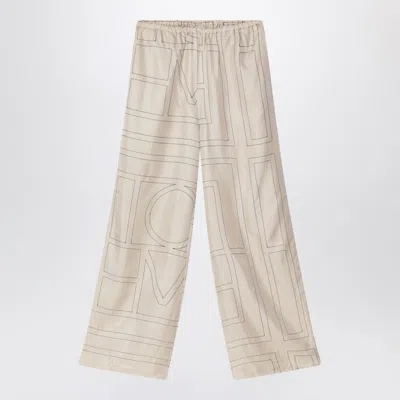 Totême Monogram Ivory Silk Trousers In White