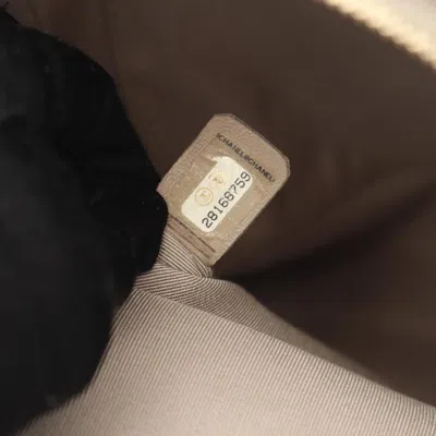 Pre-owned Chanel Beige Fabric Leather Backpack () In Sand