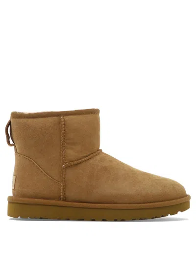 Ugg 10mm Mini Classic Ii Shearling Boots In Brown