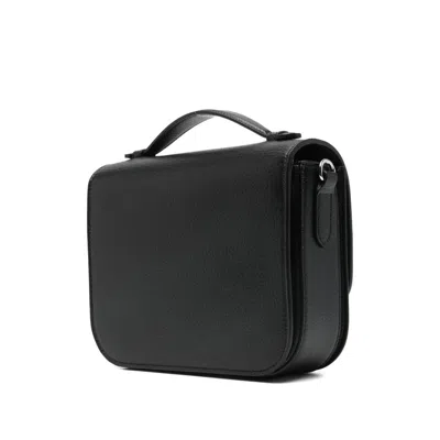 Stella Mccartney Logo-studded Mini Bag In Black