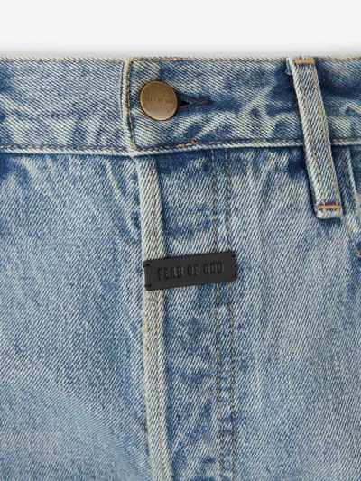 Fear Of God Men Blue Five-pocket Jeans With Front Logo Patch In Denim Man