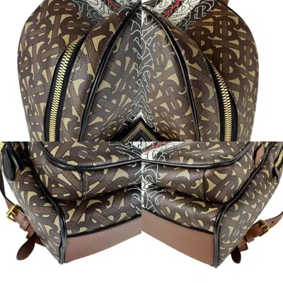 Pre-owned Burberry Black Brown White Coated Canvas Pvc Leather Backpack () In Multi