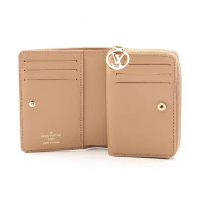 Pre-owned Louis Vuitton Beige Camel Leather Wallet (bi-fold) () In Brown