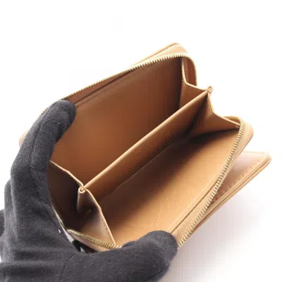 Pre-owned Louis Vuitton Beige Camel Leather Wallet (bi-fold) () In Brown